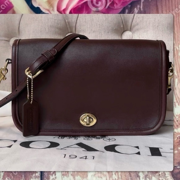VINTAGE COACH CROSSBODY MAHOGANY PENNY POCKET PURSE / BAG
Style #9755 - Picture 1 of 16